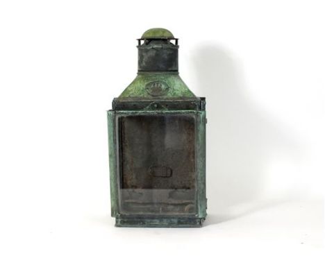 A Joseph Ratcliff &amp; Sons metal railway lamp, of rectangular section with canted top and chimney and oval tablet stamped '