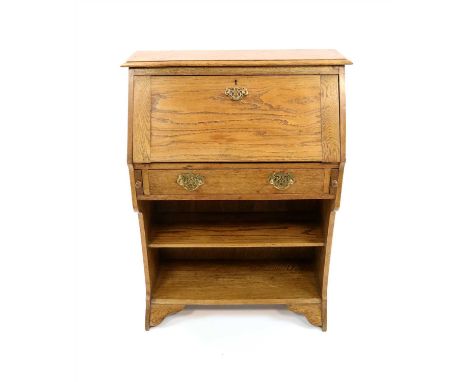 An early 20th century pale oak hall / student's bureau, the falling front fitted with a divisional interior above a single fr