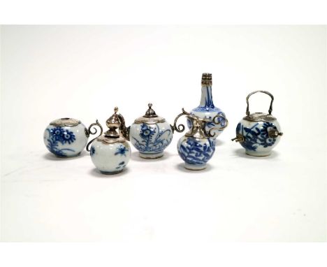 A Chinese blue and white miniature service mounted in white silver, a Chinese model of a turquoise duck, a Chinese famille ve