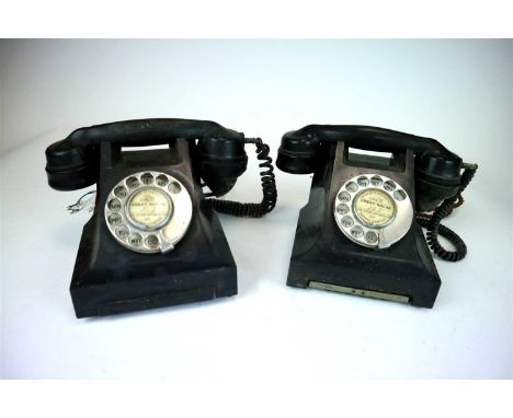 Two early 20th century black bakelite telephones, the chrome number dials centred with a Great Bolas (Shropshire) number card