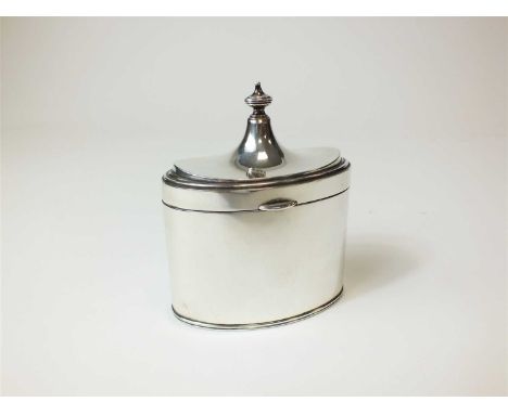 A Goldsmiths &amp; Silversmiths Co Ltd silver tea caddy, London 1924, of oval plain polished form with urn finial to the hing