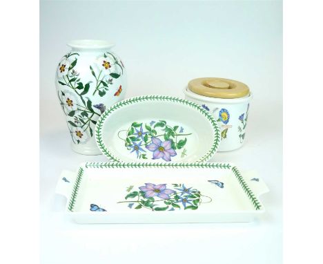 A large collection of Portmeirion Botanic Garden tableware comprising dinner plates in large and medium sizes, sideplates, st