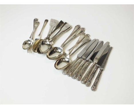 A set of six George III Fiddle pattern silver spoons, I L, London 1815, together with a harlequin collection of silver handle