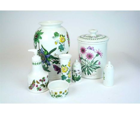 A collection of twenty pieces of Portmeirion Botanic Garden tableware including soap dispensers, vases, storage jars and cove