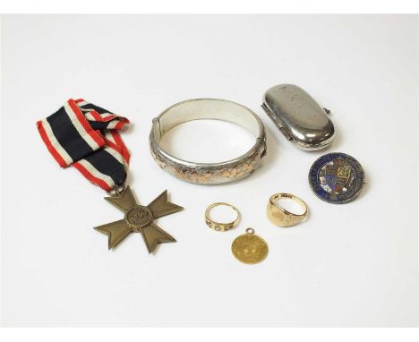 A collection of jewellery, coins and medals, to include; an 18ct gold ruby and diamond ring, a 9ct gold signet ring, a South 