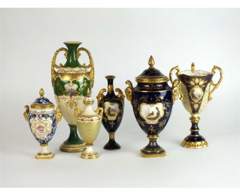 A group of Coalport, late 19th century, comprising a twin handled green and lemon landscape vase, a jewelled twin-handled vas