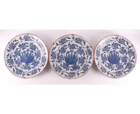 Three blue/white Delft earthenware 'Mimosa' dishes, Holland, 18th century. Blue underglaze decor of ears of corn on the shelf