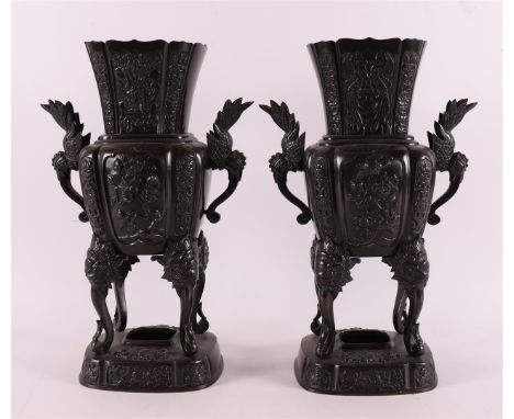A set of brown patinated bronze incense vases with handles, Japan, Meiji, around 1900. Relief decor of flora and birds, h 31 