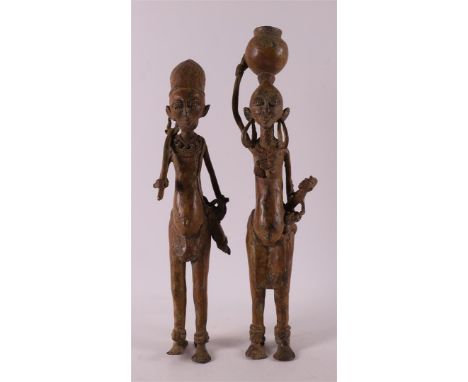 Ethnographic/tribal. A Benin bronze man and woman, Nigeria, Africa, 2nd half of the 20th century, h 43.5 cm, to. 2x.