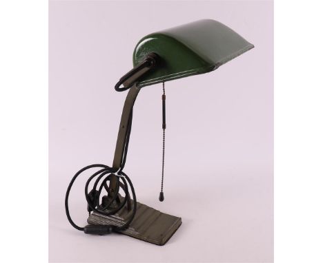 An Art Deco Bauhausnotaris desk lamp 'Erpe', Germany, 1930s. Green enamel shade, stepped cast iron base, equipped with pull c