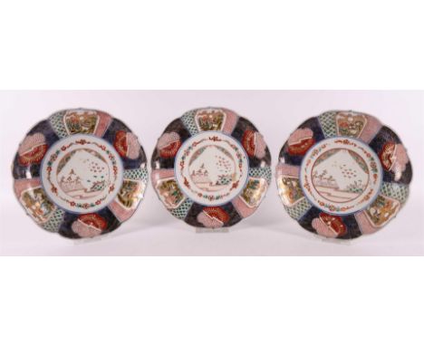 A series of three contoured Imari dishes, Japan, Meiji, late 19th century. Blue/red, partly gold-heaved decor of a volcanic l