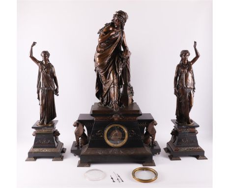 A bronze 'mantle clock', pendulum set on natural stones, France, Napoleon III, by Moreau Math., 19th century. Incomplete, mov