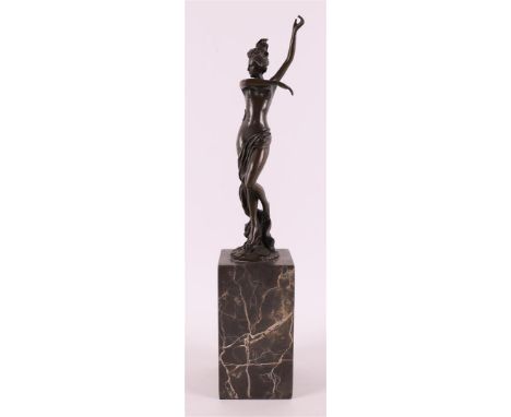 A brown patinated bronze sculpture of a female nude on a black marble base, after an antique example, 21st century. Bears sig