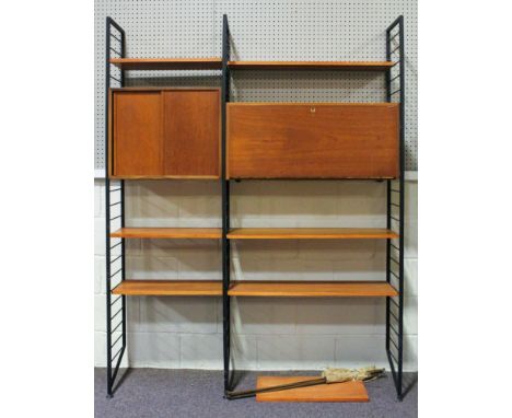 A retro Ladderax style teak shelving and storage unit, with a panelled cupboard with sliding door enclosing a shelf, seven sh