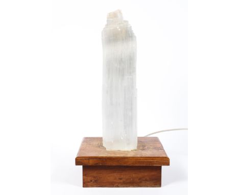 A retro quartz lamp, mounted on wooden plinth base, fitted for electricity, 52 cm high