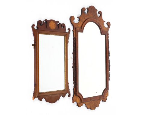 Two Georgian style mirrors, the first mahogany example inlaid with satinwood medallion, within scrollwork mantling, the secon
