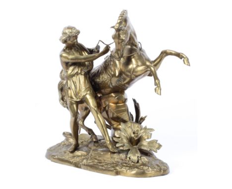 After Coustou, a large gilt metal model of a Marly horse on naturalistic oval base. 50cm x 48cm x 22cm. 