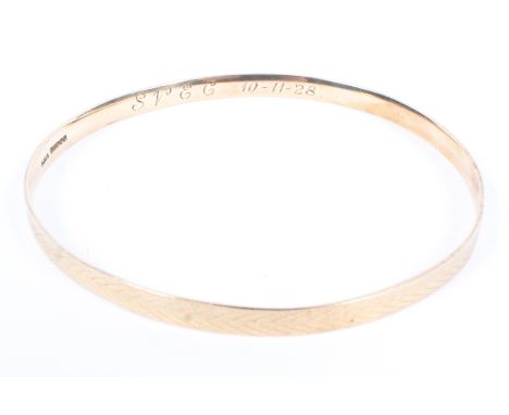 A 9ct gold bangle bracelet. 78mm(d) 15g. 