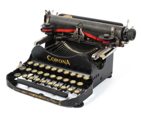 A vintage Corona folding travel typewriter model 3, manufactured by the Corona typewriter company inc, 26cm wide