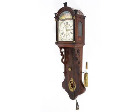 A large Continental mahogany hanging wall clock with white painted arch face with Roman numeral markers and floral spandrels.