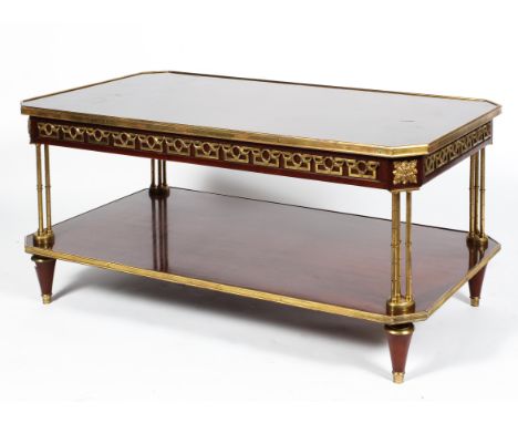 A contemporary French Louis XVI style mahogany and gilt-metal mounted coffee-table, of canted rectangular section, with gilt-