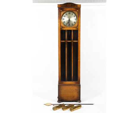 A Secessionist style oak longcase clock, early 20th century, the front hinged glazed panel with linear divisions, the silvere