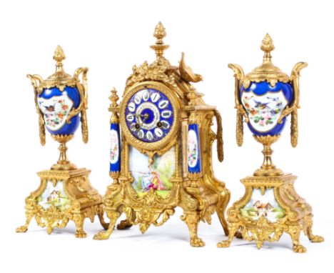 A French gilt-metal and Sevres-style porcelain mounted three piece mantle clock garniture, late 19th/early 20th century, comp