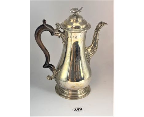 George III silver coffee pot, London 1761, maker Preston Bros. With fruitwood handle, eagle finial and contemporary crest. 11