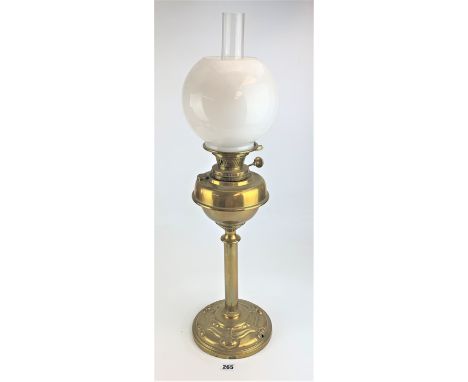 Brass oil lamp marked Youngs  Central Draught 20" high with white glass shade and funnel