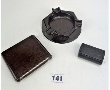 Bakelite ashtray, 'Wun Up' cigarette case and snuff box