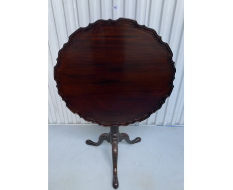 Mahogany tilt top table with scalloped edges on tripod stand, 28" diameter, 28" high, 44" lifted