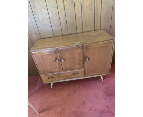 &nbsp;Ercol Sideboard Mid Century light brown with 2 cupboards and drawer. 45" w x 17" d x 32" h. A few marks to the top