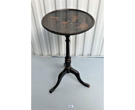 Black lacquered tripod table with oriental scene, 12" diameter x 24"h