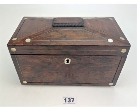 Wooden tea caddy inlaid with mother of pearl containing 2 lidded compartments 9.25" x 5.25" x 5.75" high. Damage on back