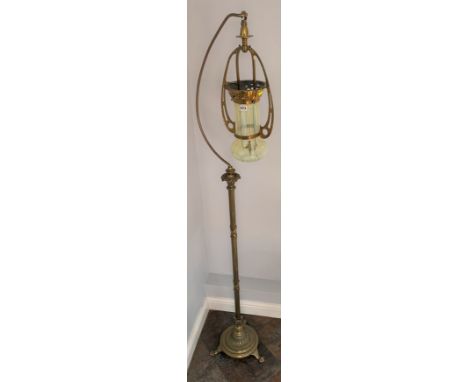 Art Nouveau brass standard lamp 48" high, 72" high to top of fitting, with brass and vaseline glass shade 24" high