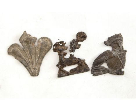 Three Pilgrims badges (various themes) 14th/15th Century. The first badge represents a hart standing by a tree and was found 