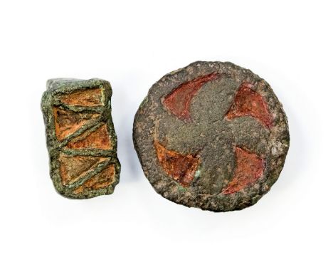 Two early Romano British Strap Attachments 1st Century AD. Two decorated enamelled strap slides used primarily to slide over 
