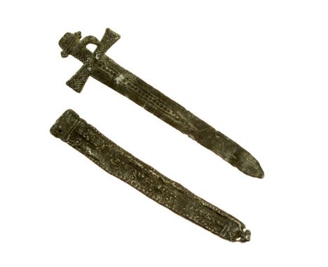 Thomas Becket sword and scabbard pilgrims badges. Two pilgrims badges in the form of the sword that killed Thomas Becket and 