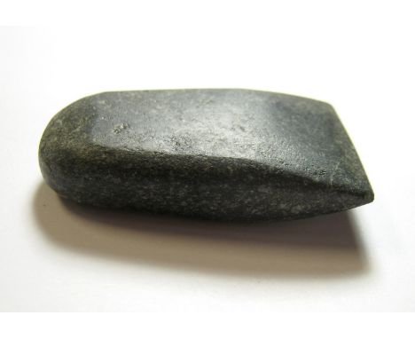 Small Neolithic votive axe 3000 BC-1500 BC.A Neolithic votive stone axe, possibly Eastern European in origin, 47 mm length, 2