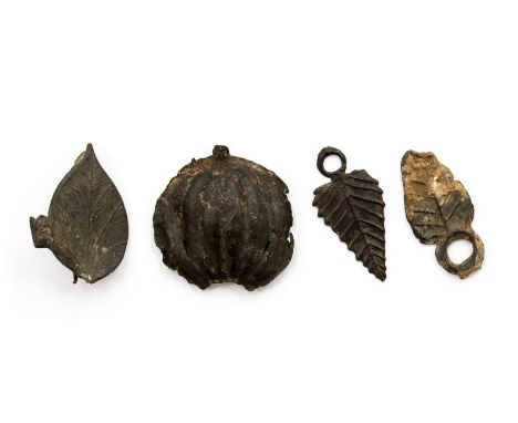 Medieval pomegranate and leaf badge group. Pewter badge in the form of a pomegranate, associated with Katherine of Aragon, fi