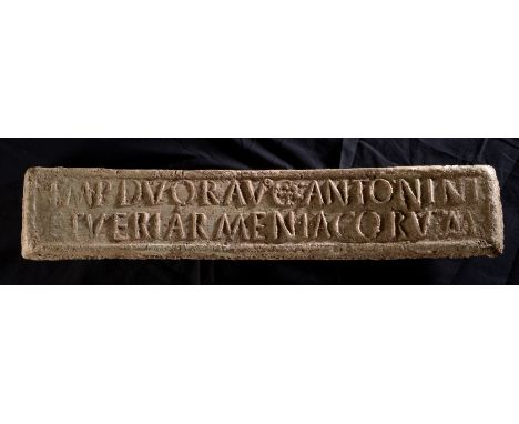 A Roman lead ingot c. AD 164 - 169 with relief inscription IMP DVOR AVG ANTONINI ET VERI ARMENIACORVM in two lines.The inscri