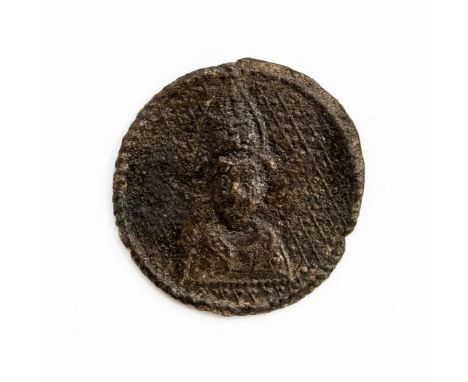 'St Osmund' pilgrim's badge. A circular pewter badge depicting the mitred bust of St Osmund, who was appointed Bishop of Sali