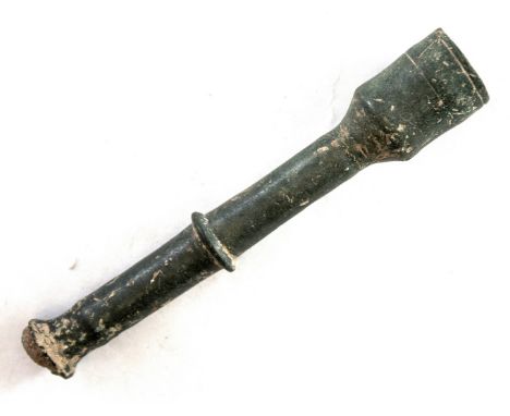Medieval Candlestick. The stem and candle socket of a late medieval copper-alloy candlestick. The stem has a collar mid-way a