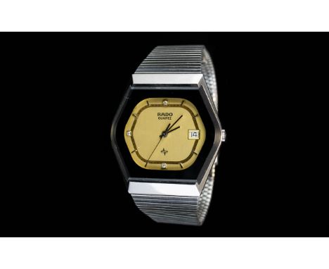 Rado Quartz Wristwatch with hexagonal face, stainless steel watch and gold dial. Date and diamontes to 12 6 and 9 clock.