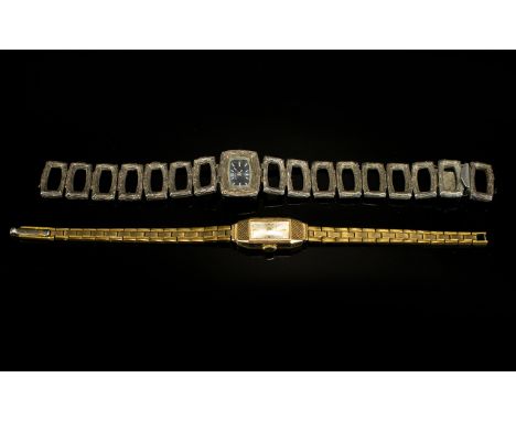 Ladies Manual Wind Caravelle Silver Wrist Watch Together with a ladies 9ct manual wind everite watch on rolled gold bracelet