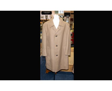 A Gentleman's Vintage Heavyweight Wool Coat Single breast camel wool coat with brown satin and wool plaid liner with zipped i