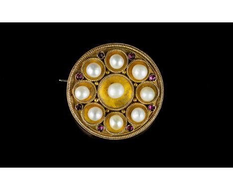 Antique Period Circular 9ct Gold ( Rich Colour ) Pearl and Garnet Set Brooch of Attractive Form. Marked 9ct Gold. In Excellen