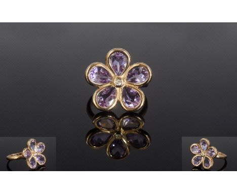 Rose de France Amethyst and Natural White Zircon Flower Ring, five pear cut, semi-bezel set Rose de France amethysts, in a fl