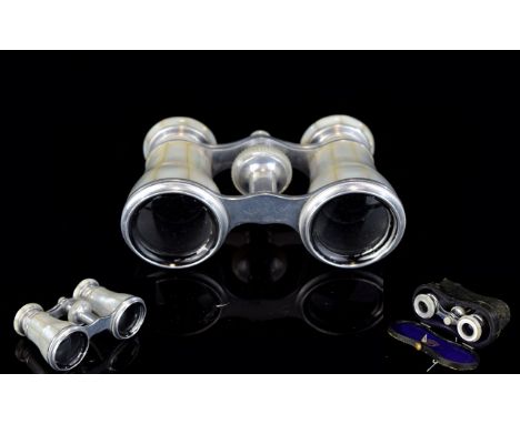 Antique Opera Glasses Housed in original case, silver tone binoculars with mother of pearl to outer. Good condition, inner ca