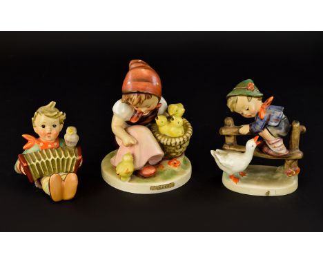 Three Hummel Figures Each in good condition, each marked to base with blue factory mark and 'W Germany' stamp. The first 'Chi